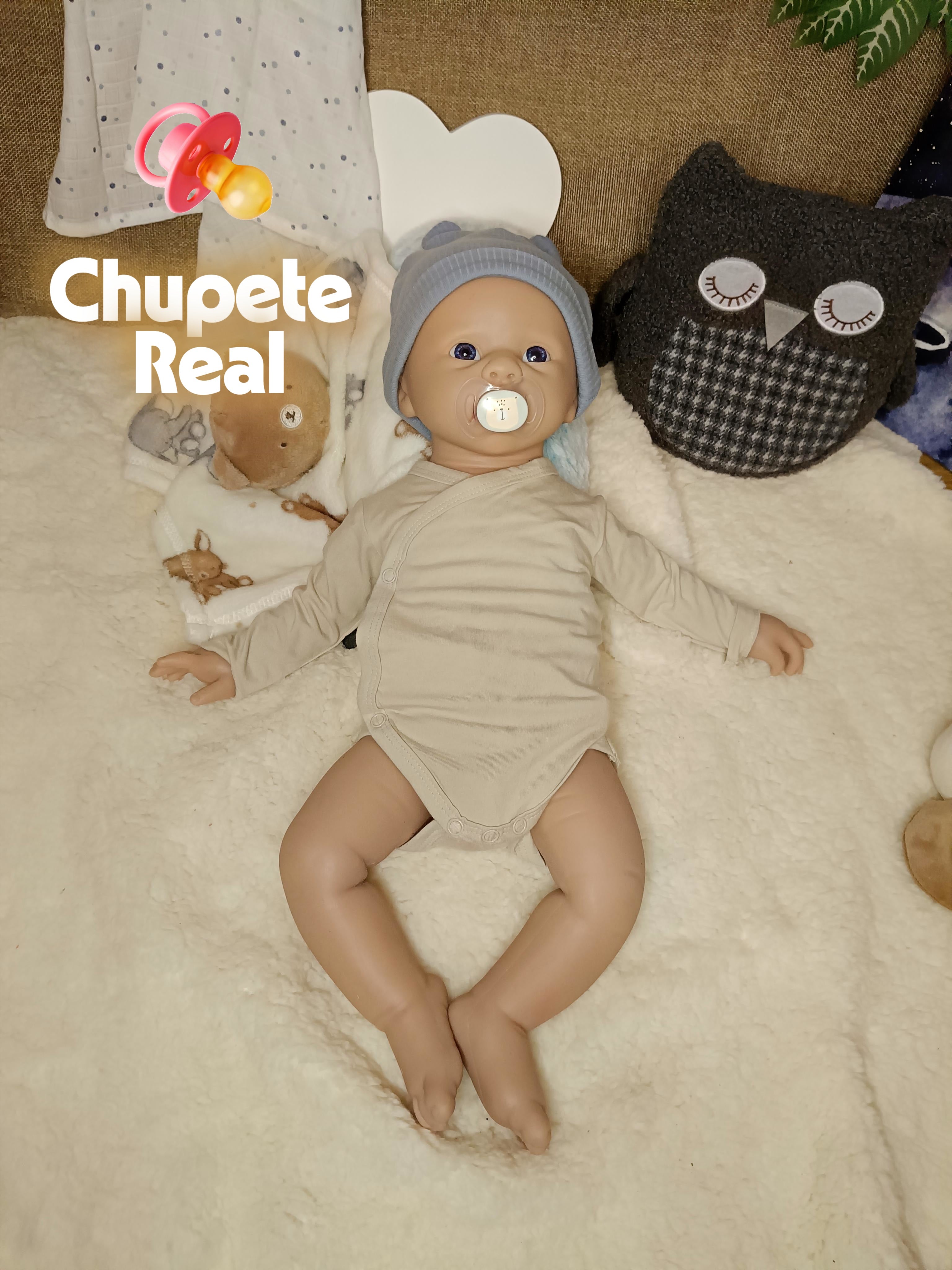 muñeco de sillicona y peluche de buho